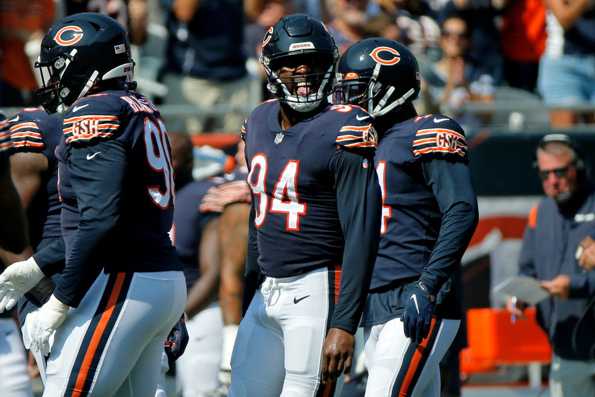 Sep 19, 2021; Chicago, Illinois, USA; Chicago Bears linebacker Robert Quinn (94) celebrates after sacking Cincinnati Bengals quarterback Joe Burrow (9) during the first quarter at Soldier Field. Mandatory Credit: Jon Durr-USA TODAY Sports